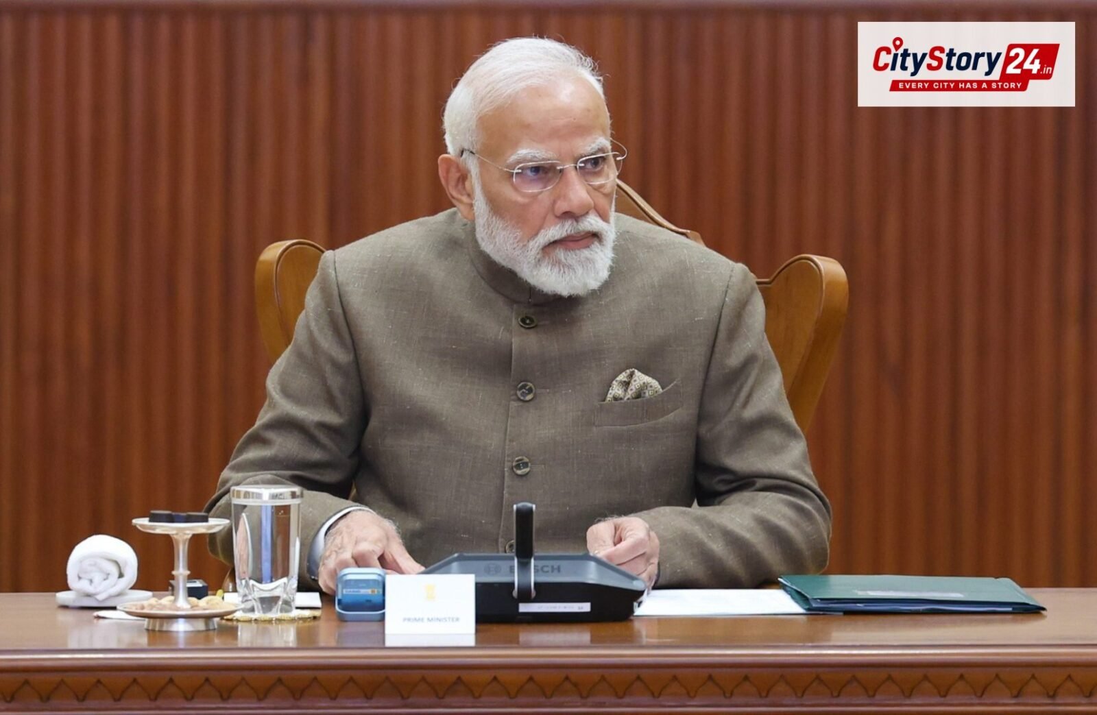 Defence Minister congratulates PM Modi on completing 25 years in public service